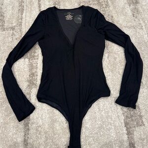 NWT- Klassy Network Long Sleeve Bodysuit